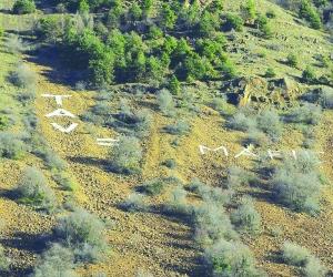 Almese, la scritta "Tav=Mafie" sul Musinè è da togliere?