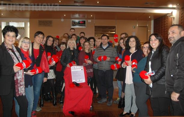 No alla violenza sulle donne: in cintura ecco le "vetrine rosse"